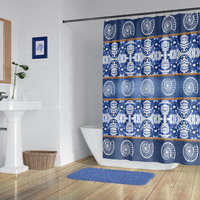 blue seashell shower curtain in s large modern bathroom with wood flooring