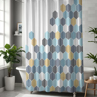 Abstract honeycomb-shaped trees design shower curtain in navy blue, rackley blue, light blue and gold (not glittery) on a white background hung in a bathroom