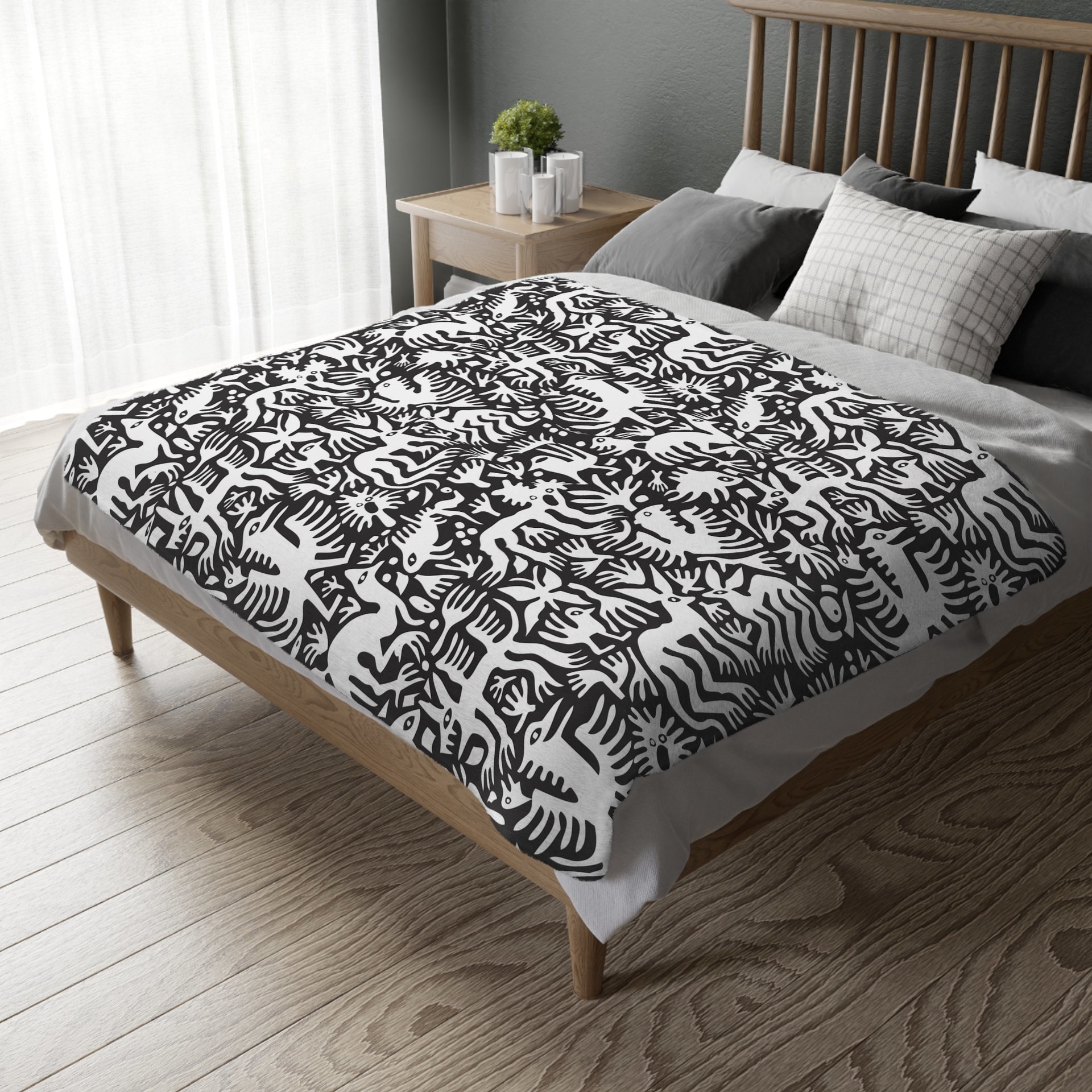 White hand-drawn folk art animals and plants printed on a lightweight, soft and plush two-sided velveteen throw blanket.