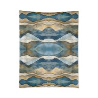 Twin comforter printed with an abstract watercolor winter landscape