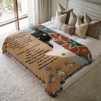 Personalized cat blanket on a bed