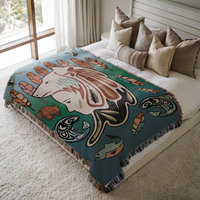 Shananic Medicine Woman Blanket on a bed