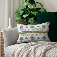 Geometric art in white, light teal, tan, and brown. Each side has a different Aztec design using the same color palette.