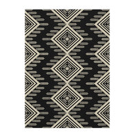 An Aztec or ethnic pattern geometrical design in black and beige