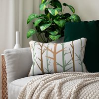 Bare Trees Design Lumbar Pillow on a couch