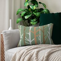 Bare Trees Design Lumbar Pillow on a couch