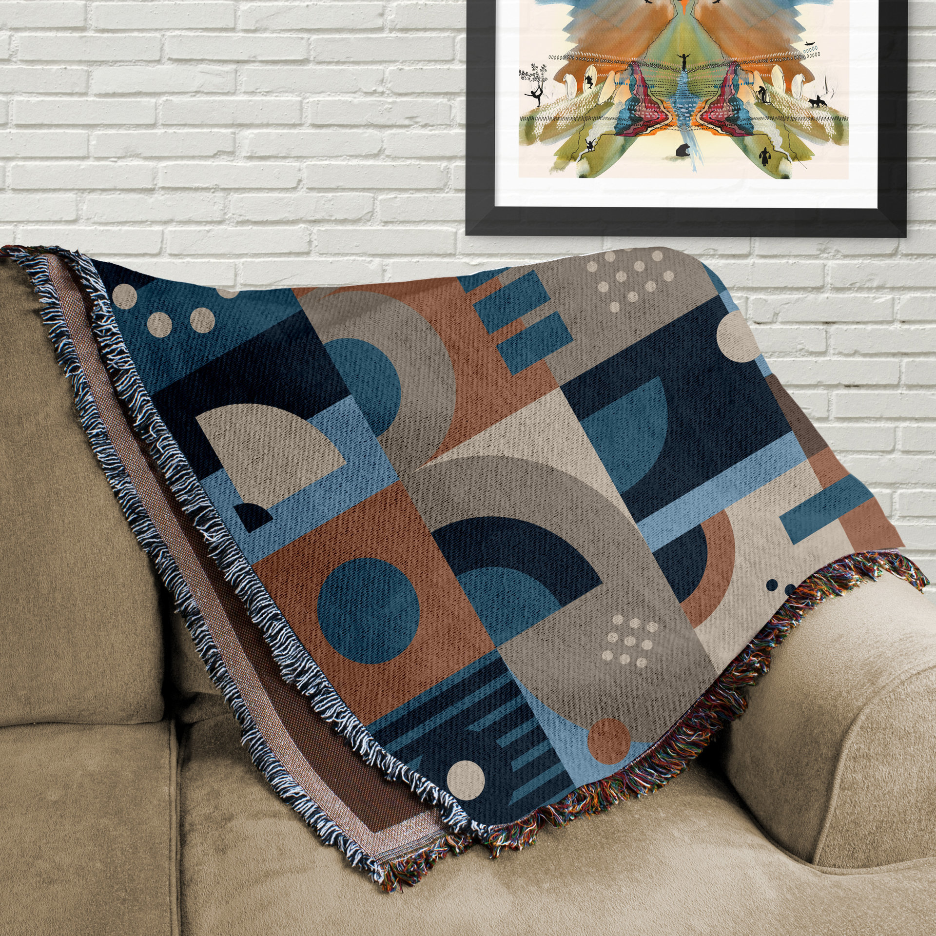 Blue and Brown Abstract Geometric Shapes Woven Cotton Blanket folded on a couch