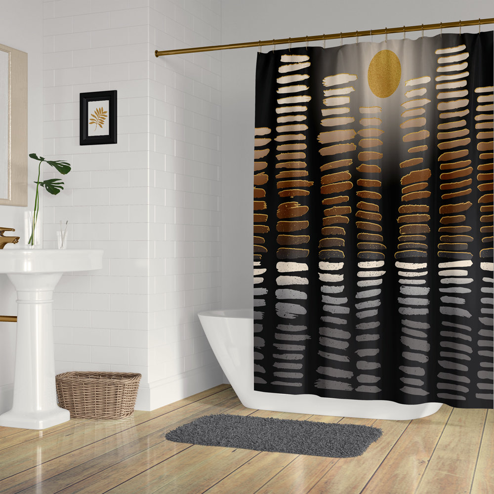 Shower curtain hung in a modern, minimalist bathroom. The striped design resembles a city skyline reflected in the river under a full moon.