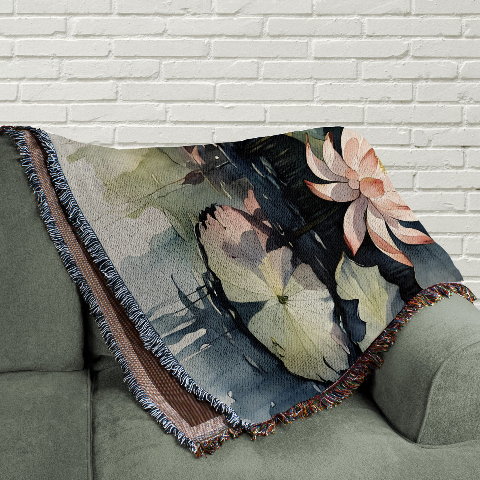 Water Lilies Woven Cotton Blanket folded on a couch