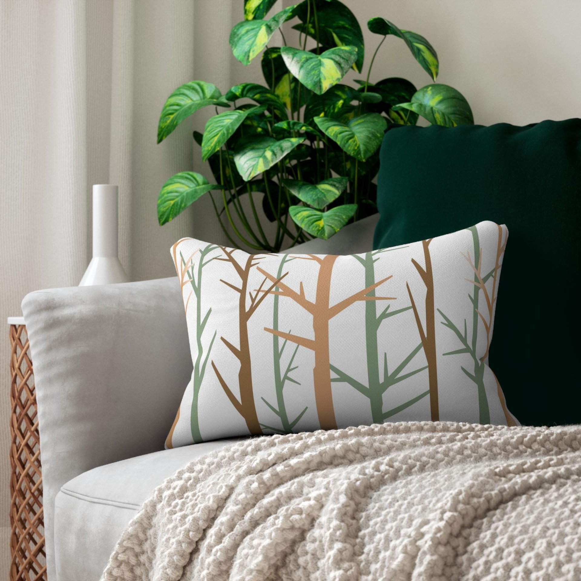 Bare Trees Design Lumbar Pillow on a couch