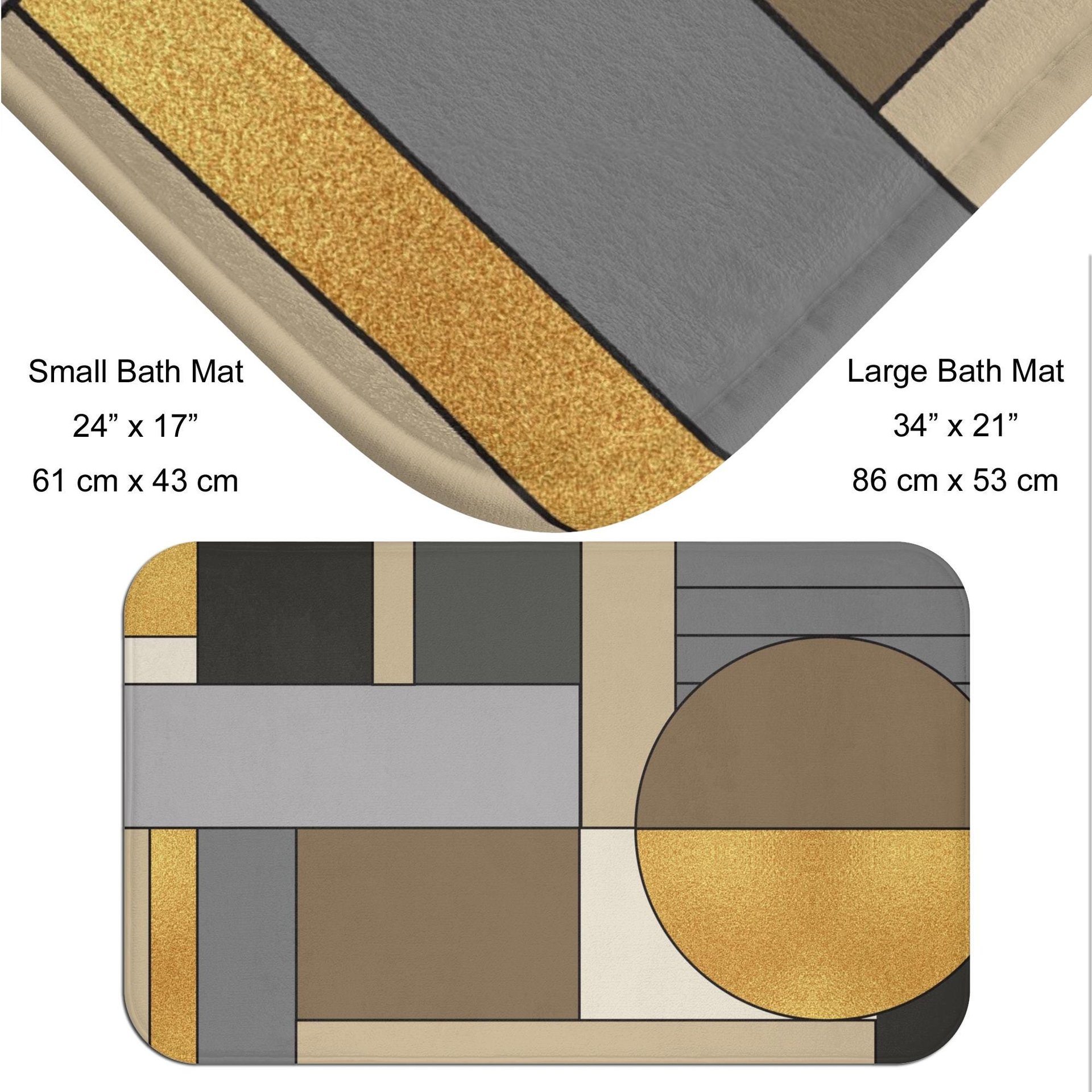 Mid-Century modern bath mat in muted shades of brown, gray, and black with textured gold elements that suggest a metallic or glittery effect which create a sense of elegance and understated luxury.