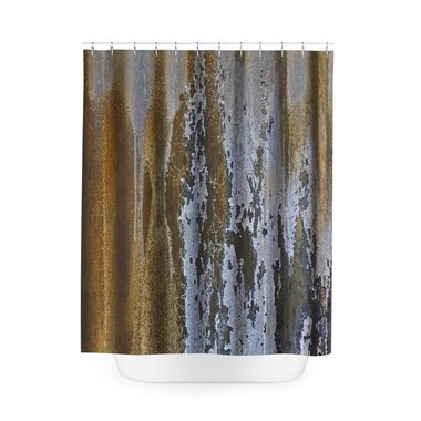 Unusual grunge shower curtain in gray, brown and gold with blue flaking paint on corrugated iron.