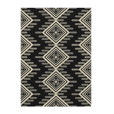 An Aztec or ethnic pattern geometrical design in black and beige